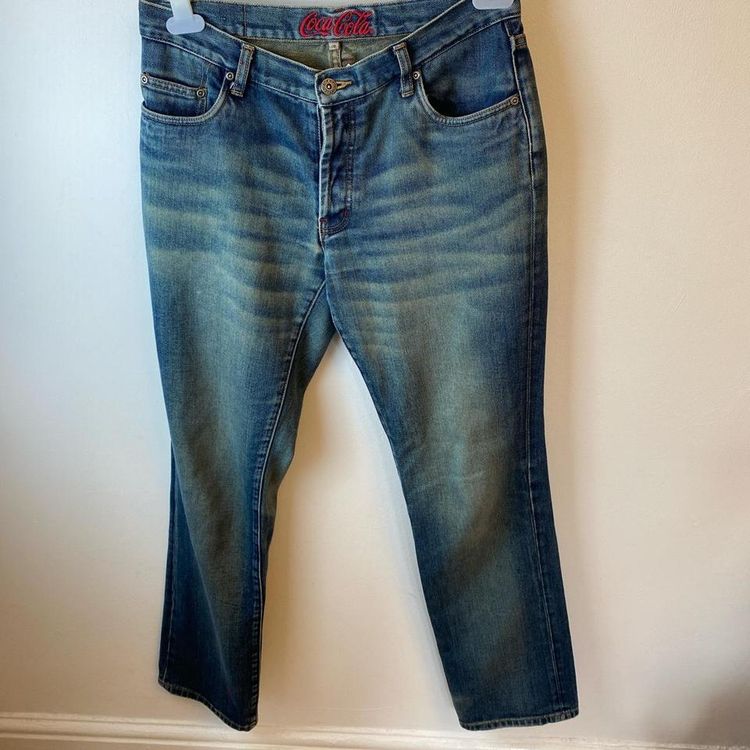 Vintage Coca Cola ware blue jeans with Coca Cola embroidery. Rare find.