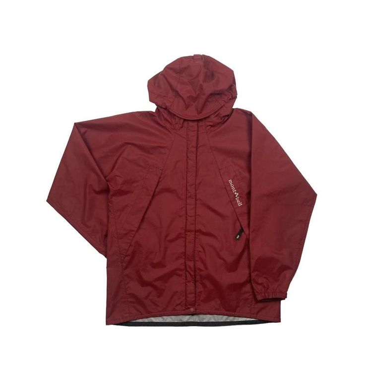 Mont Bell Jacket in red with white embroidered logo, two diagonal pockets on the chest. Peaked hood  image 1