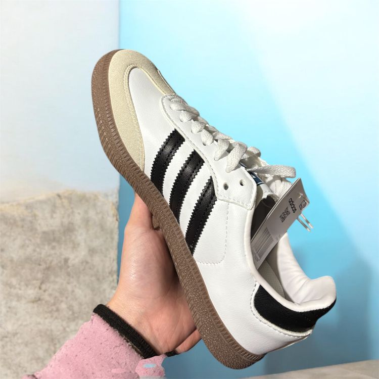 Adidas White Sneakers With Black Stripes