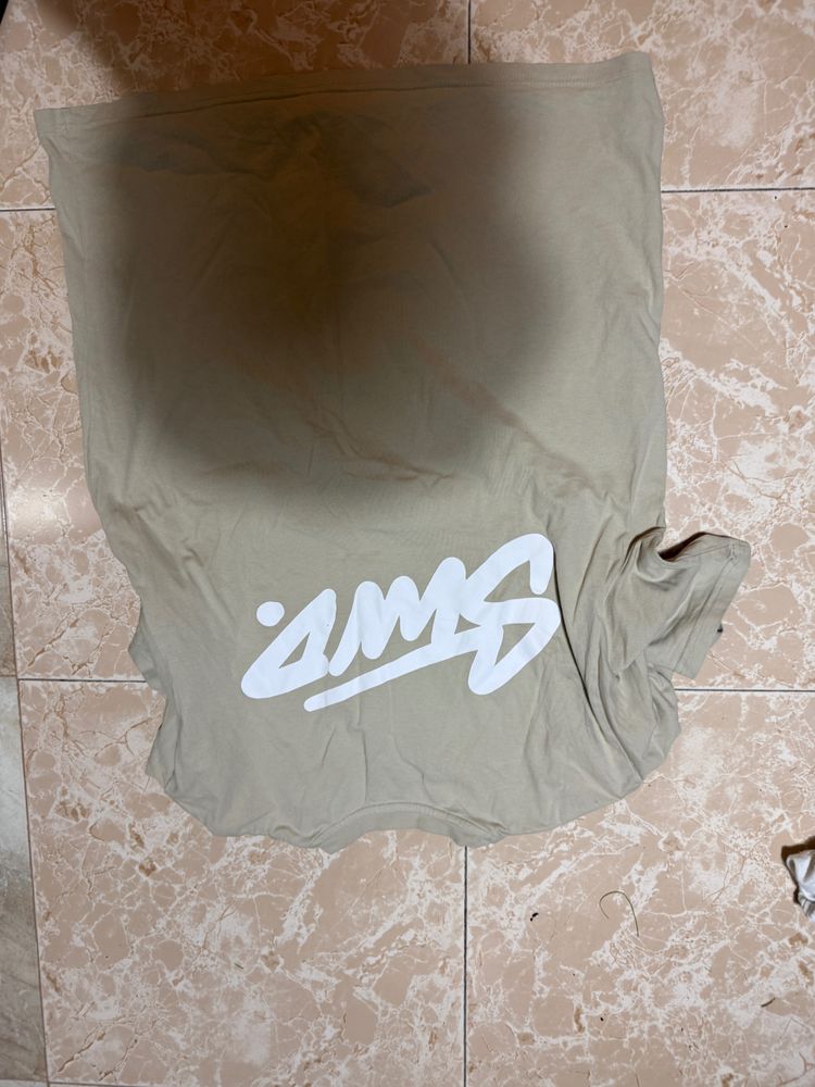 Beige T-Shirt With White Graphic Text