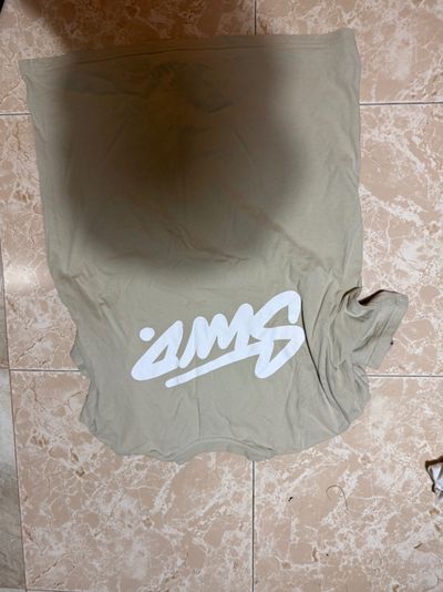 Beige T-Shirt With White Graphic Text