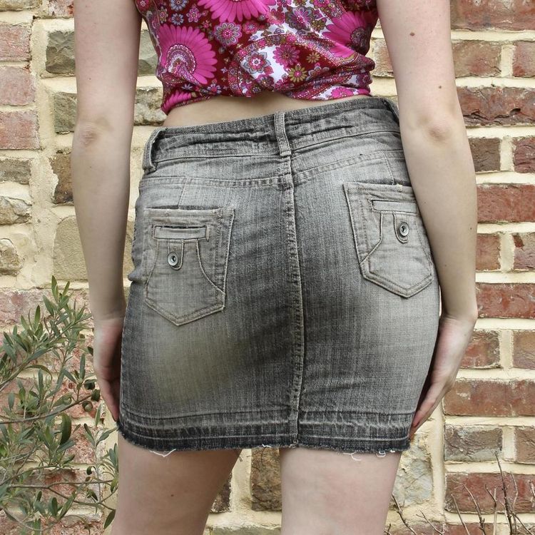 Y2K grey wash denim mini skirt with a raw hem image 4
