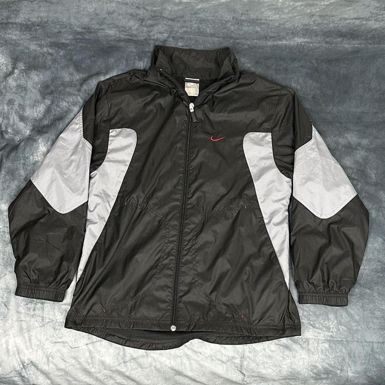 Nike Nike late 00s black Track Jacket with silver detailing around the arms and a red swoosh logo on the  product image