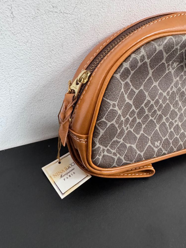 brown patterned pouch with leather trim 3