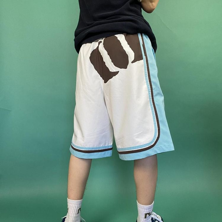Vintage y2k baggy animal board shorts white. 3