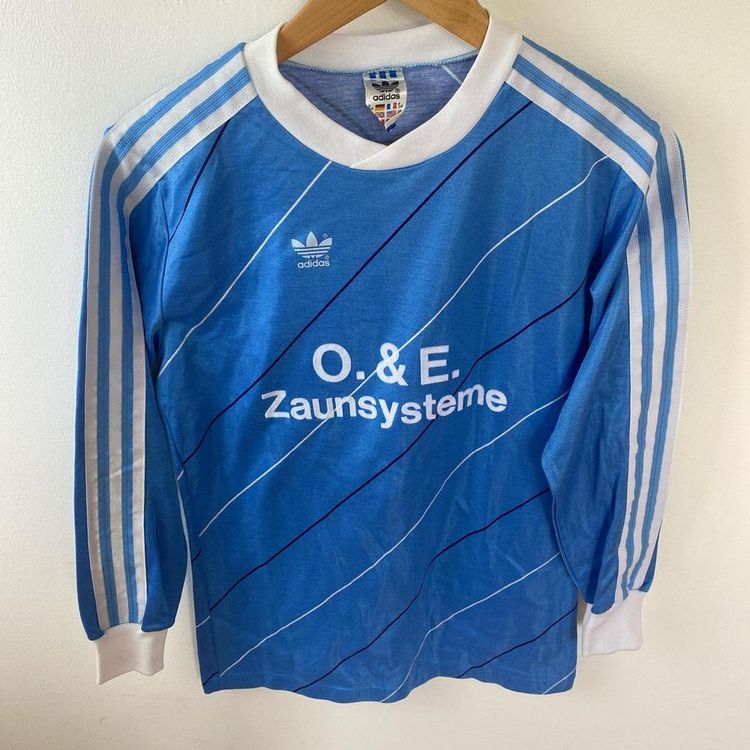 early 2000s vintage adidas long sleeve top in blue and white. Number 5 German top.