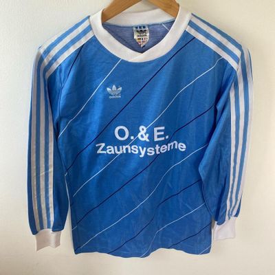 early 2000s vintage adidas long sleeve top in blue and white. Number 5 German top. 1