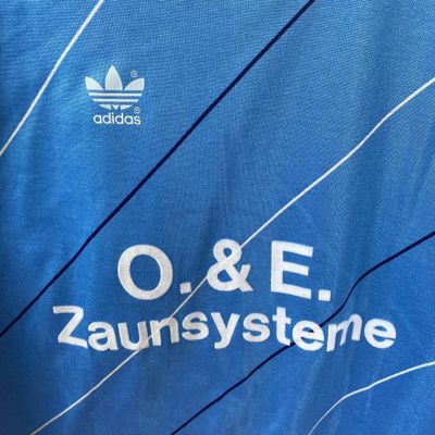 early 2000s vintage adidas long sleeve top in blue and white. Number 5 German top. 3