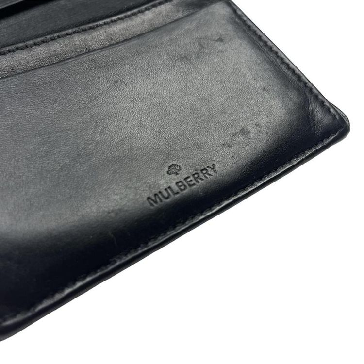 Vintage Mulberry Wallet in black leather. Iconic Tree logo embossed on the front with a spell-out l 2