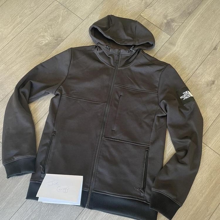 The north face zip up jacket