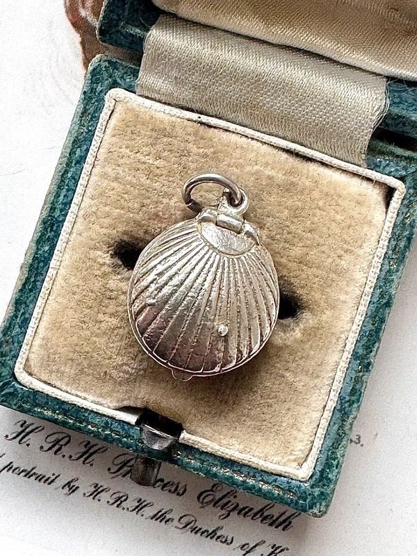 Silver Shell-Shaped Locket Pendant