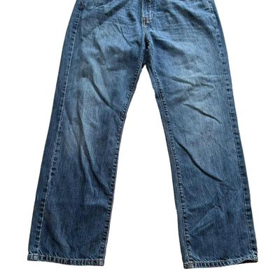 Tommy Hilfiger mid blue wash straight relaxed fit denim jeans. Small logo embroidery on the back poc 3
