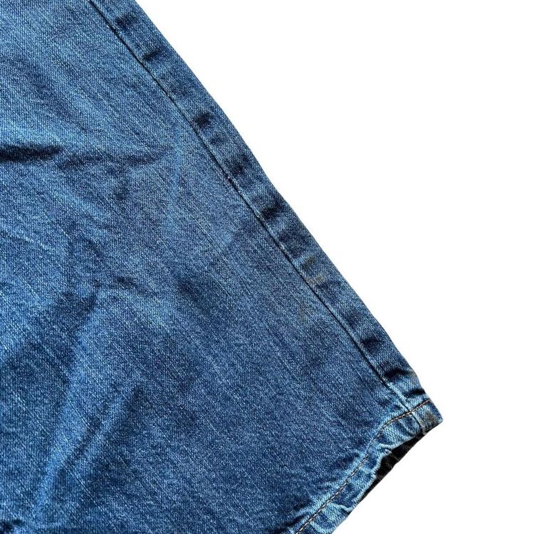 Tommy Hilfiger mid blue wash straight relaxed fit denim jeans. Small logo embroidery on the back poc 5