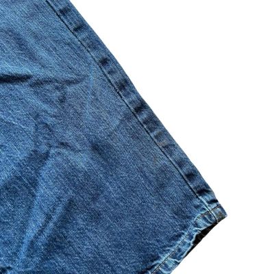 Tommy Hilfiger mid blue wash straight relaxed fit denim jeans. Small logo embroidery on the back poc 5