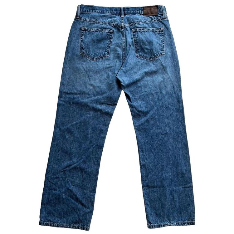 Tommy Hilfiger mid blue wash straight relaxed fit denim jeans. Small logo embroidery on the back poc 7