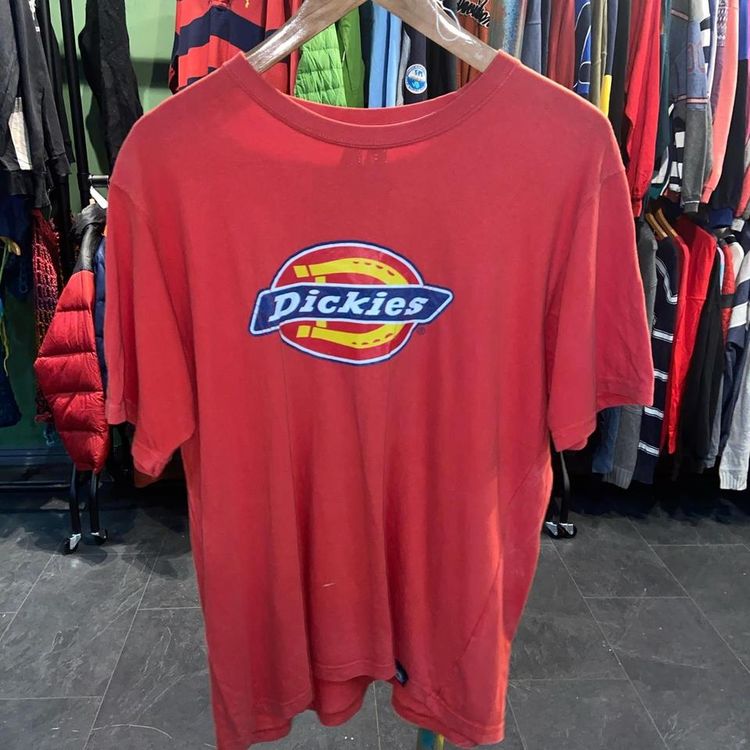 Dickies Red Dickies T-shirt. Fits true to size. Slight mark on the back as shown in photo, would most likely product image
