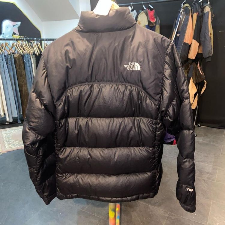 Black north face puffer. Fits true to size. Great condition other than small wear on zip as shown in 2