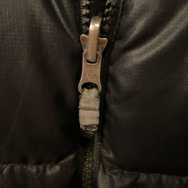 Black north face puffer. Fits true to size. Great condition other than small wear on zip as shown in 5