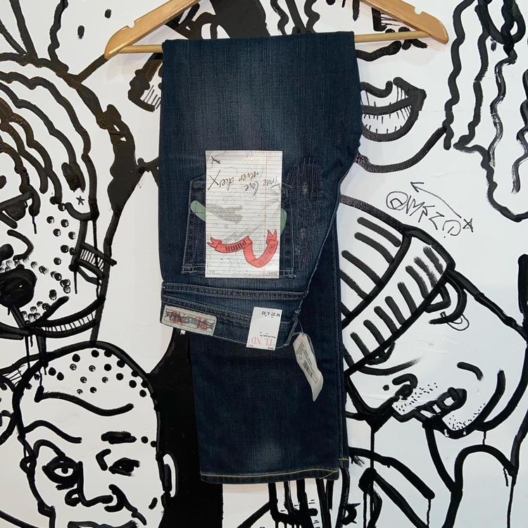 Evisu Navy blue deadstock 2002 Evisu x puma jeans 27 32. Message for more details. product image