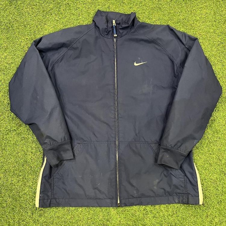 Navy 2000s Nike coat with spell out Nike on the back image 1