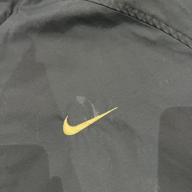 Navy 2000s Nike coat with spell out Nike on the back image 3