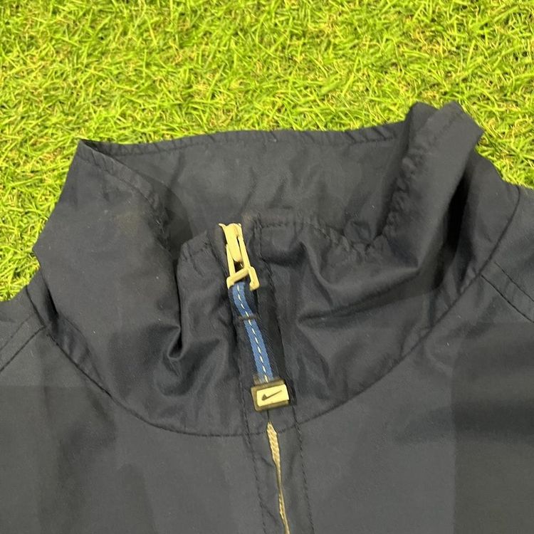 Navy 2000s Nike coat with spell out Nike on the back image 4