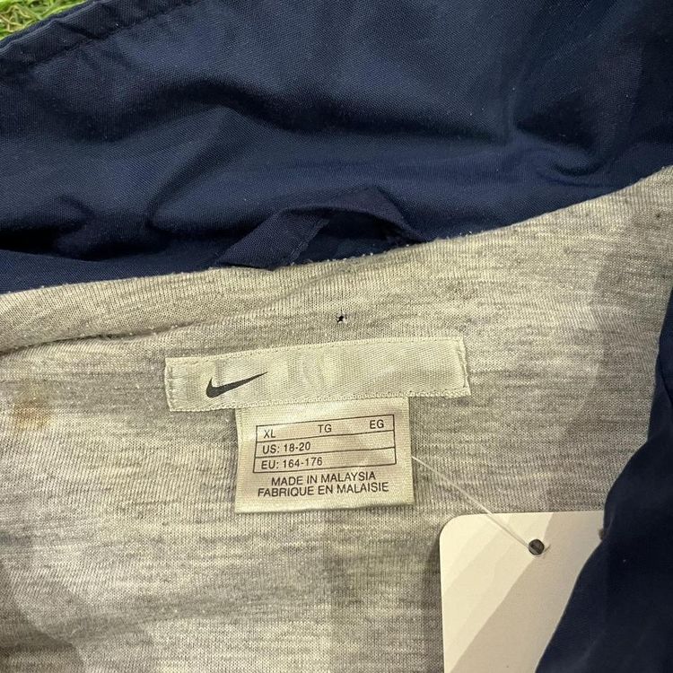 Navy 2000s Nike coat with spell out Nike on the back image 5