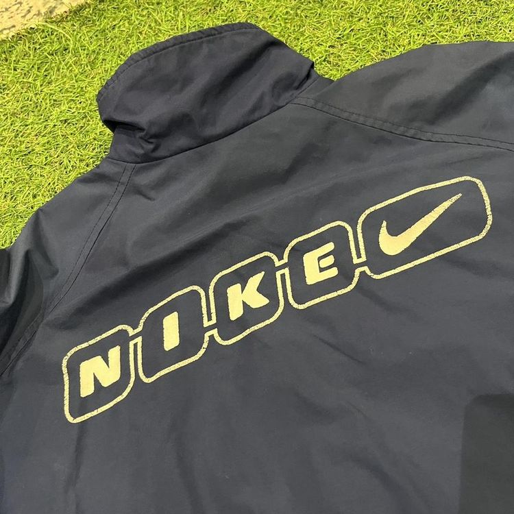 Navy 2000s Nike coat with spell out Nike on the back image 6