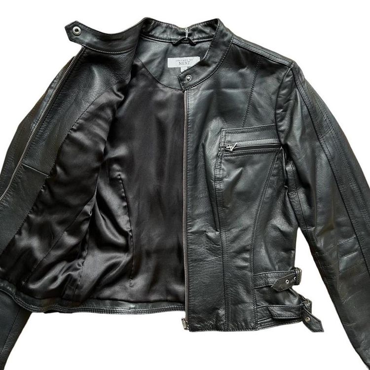 Black real leather zip up moto style jacket with silver hardware and buckle details imagen 2