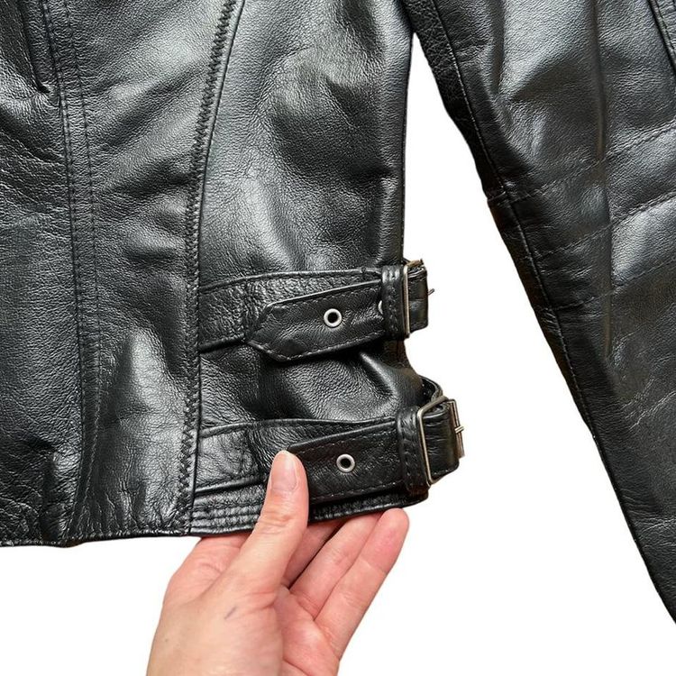 Black real leather zip up moto style jacket with silver hardware and buckle details imagen 4