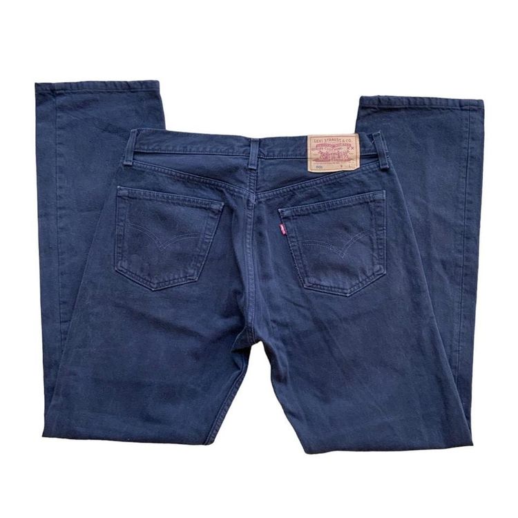 Dark navy blue Levi 501 jeans with button flies and the iconic leather patch image 1
