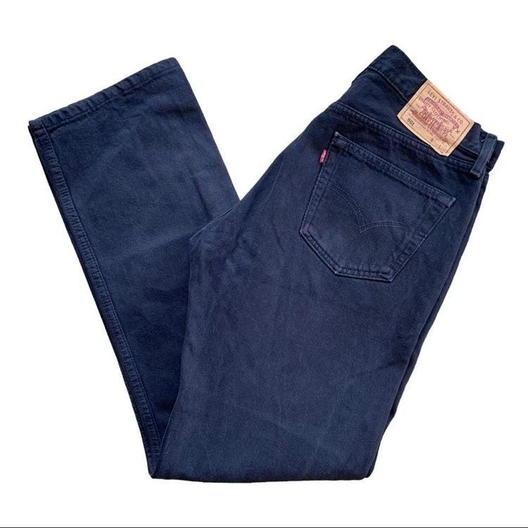 Dark navy blue Levi 501 jeans with button flies and the iconic leather patch image 2