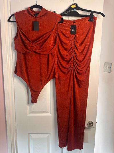 Rust Orange Sleeveless Bodysuit And Ruched Skirt set