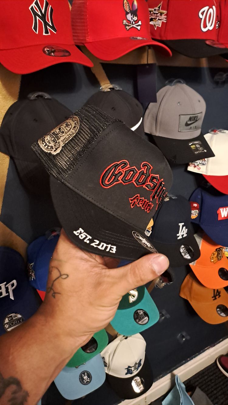 Black Mesh Trucker Cap With Red Embroidered Text