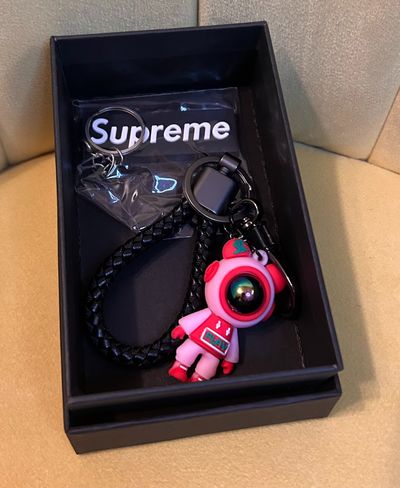 Supreme Keychain With Pink Astronaut Figure