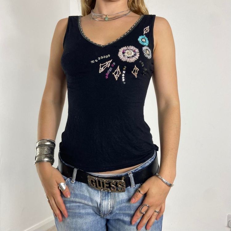black sleeveless top with embroidery