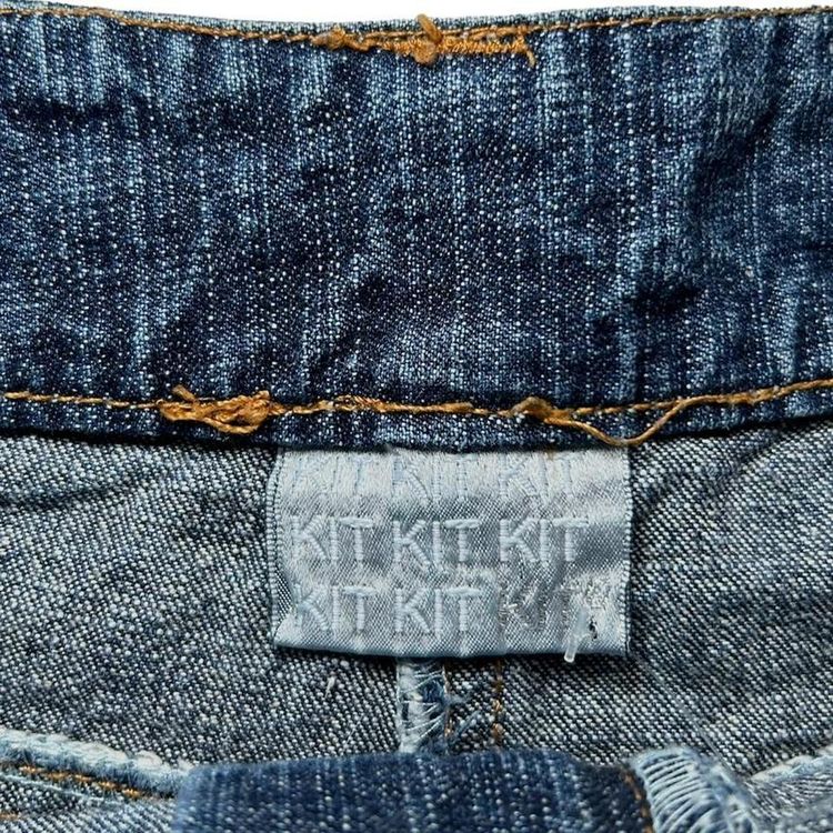 Y2K grain wash denim mini skirt with a raw hem image 5