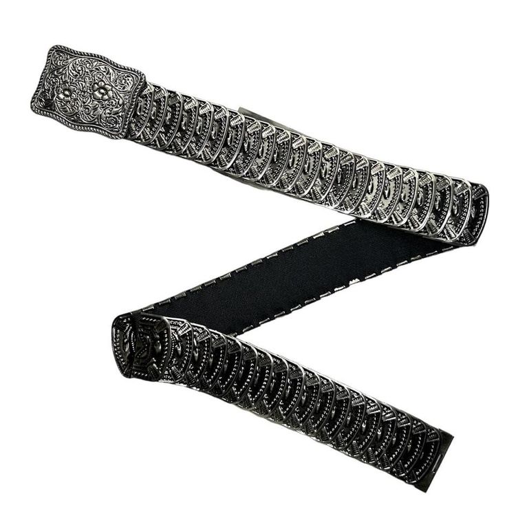 Vintage silver metal scale belt with an embossed rectangular fastening