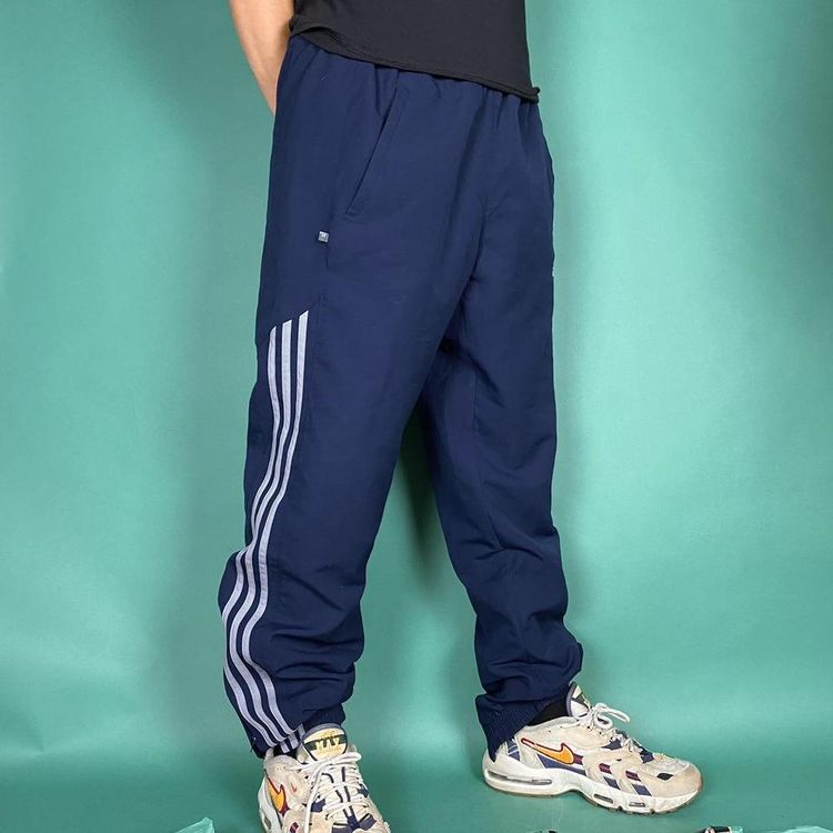 Immagine di Vintage y2k adidas track pants tracksuit bottoms navy. 2
