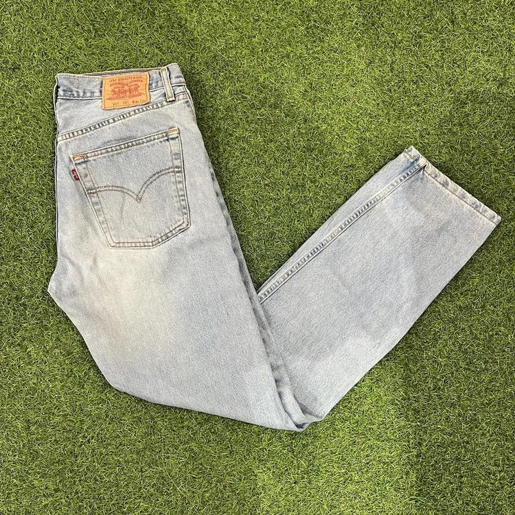 Light blue washed Levis 521 jeans