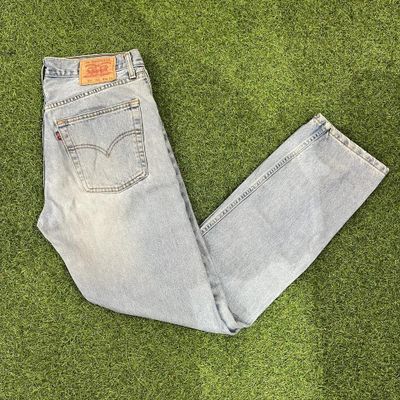 Light blue washed Levis 521 jeans