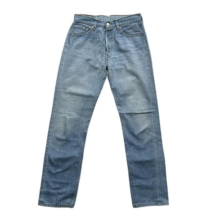 Light wash straight leg button fly Levi 501 jeans made from a stiff denim image 2