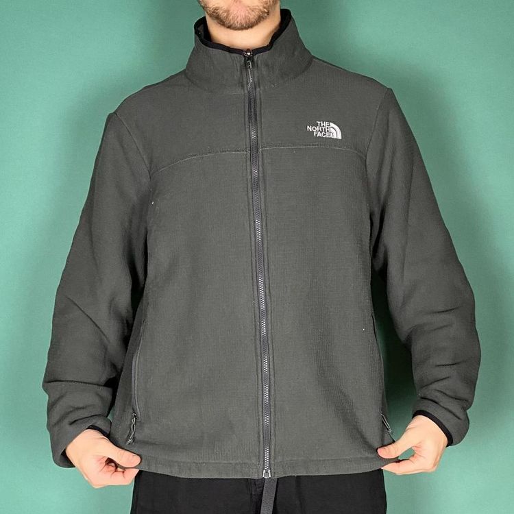 The north face fleece jacket dark grey purple tone.