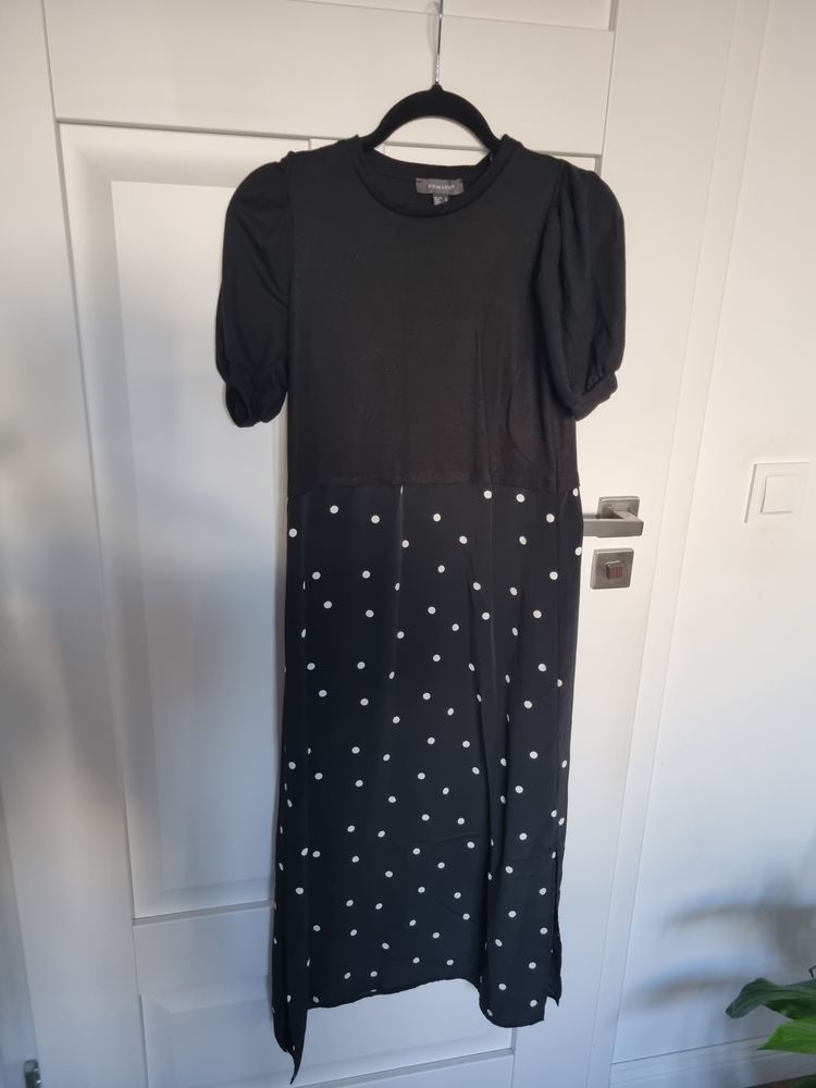 Black Dress With Puff Sleeves And Polka Dot Skirt