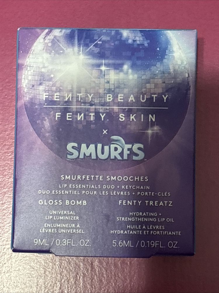 Immagine di Fenty x Smurfs SMURFETTE SMOOCHES Gloss Bomb, Treatz Lip Oil, & Keychain Holder 1