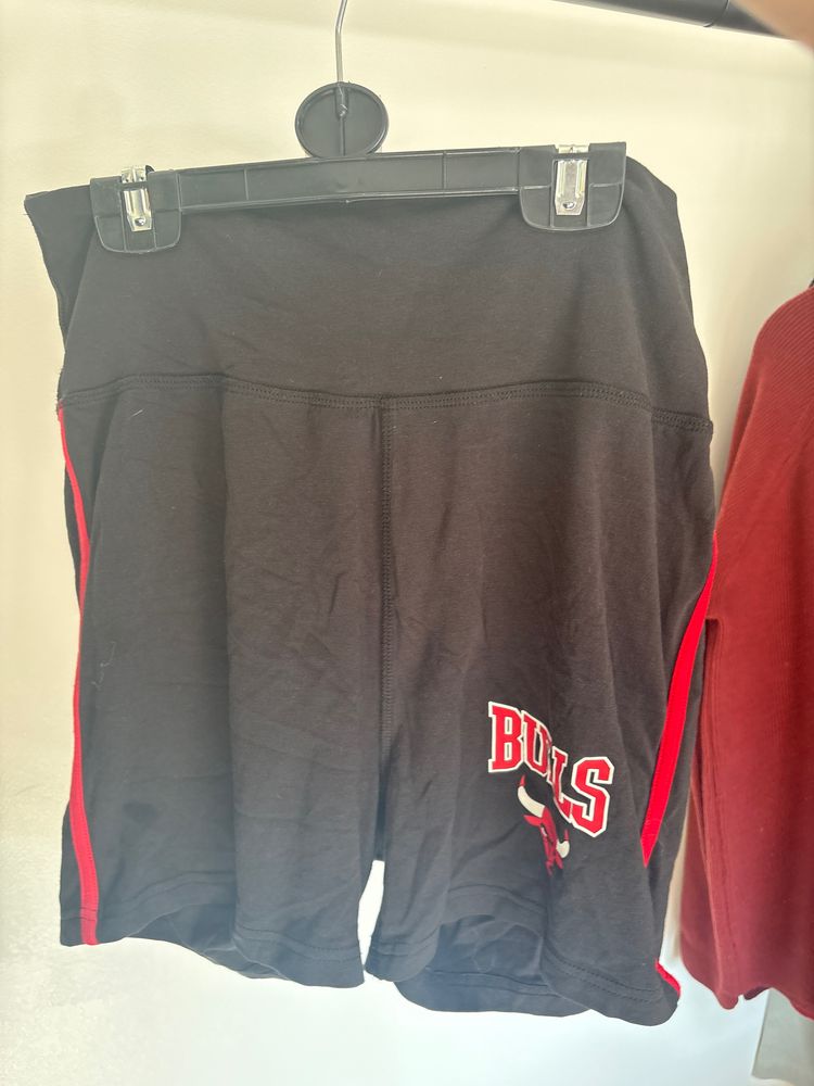 Black Shorts With Red Side Stripes And Bulls Logo
