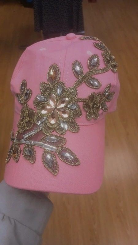 Pink Cap With Floral Embellishments image 1