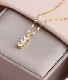 Gold Necklace With Three Clear Stones Pendant