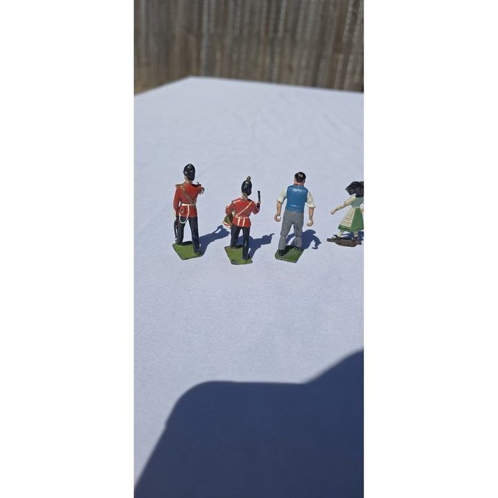 Immagine di Set Of Painted Metal Figurines 3