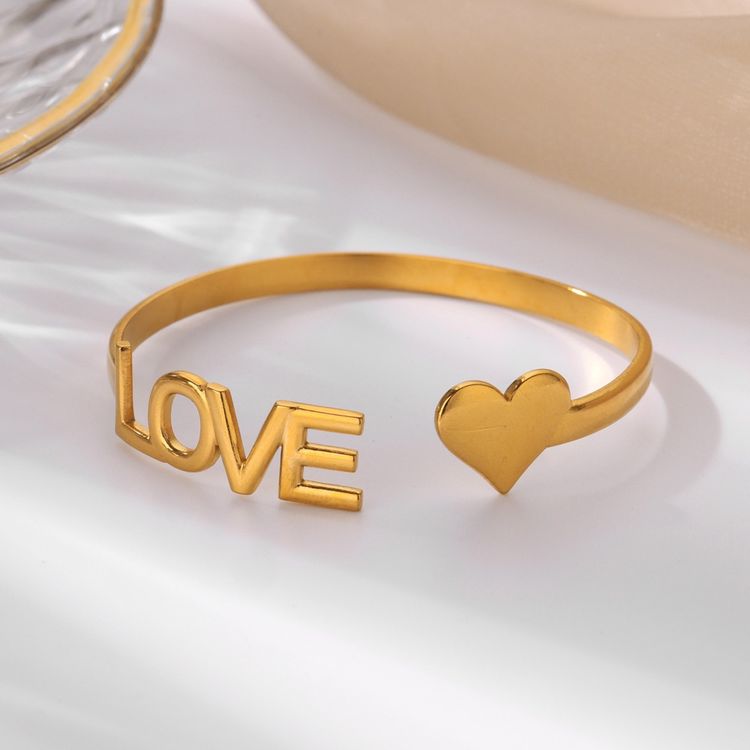 Immagine di Gold-Tone Open Bangle Bracelet With Love And Heart Design 3